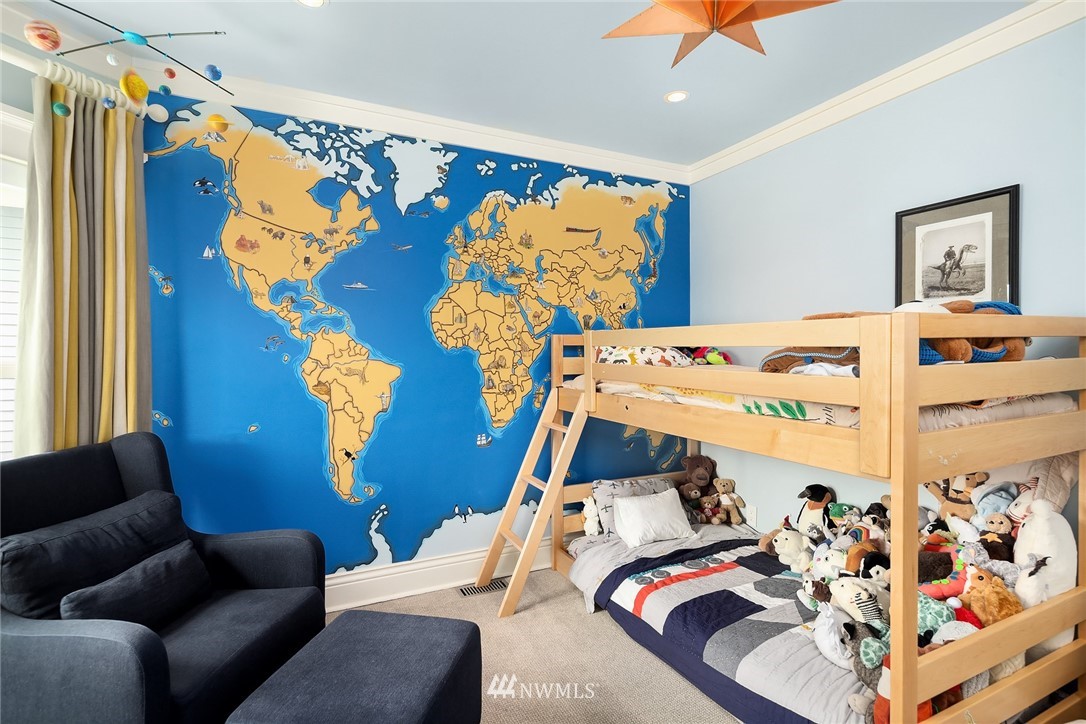 1618 37th Avenue Seattle, WA 98122 - Photo 18 of 39 a bedroom with furniture and a bed