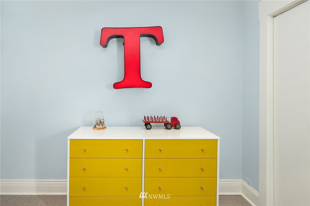1618 37th Avenue Seattle, WA 98122 - Photo 19 of 39 a bathroom with a sink and a mirror