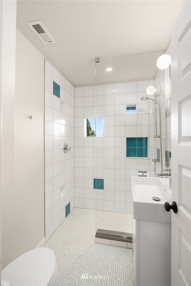 1618 37th Avenue Seattle, WA 98122 - Photo 24 of 39 a bathroom with a sink toilet and shower
