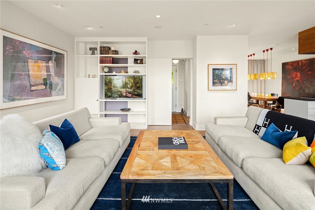 1618 37th Avenue Seattle, WA 98122 - Photo 5 of 39 a living room with furniture and a flat screen tv