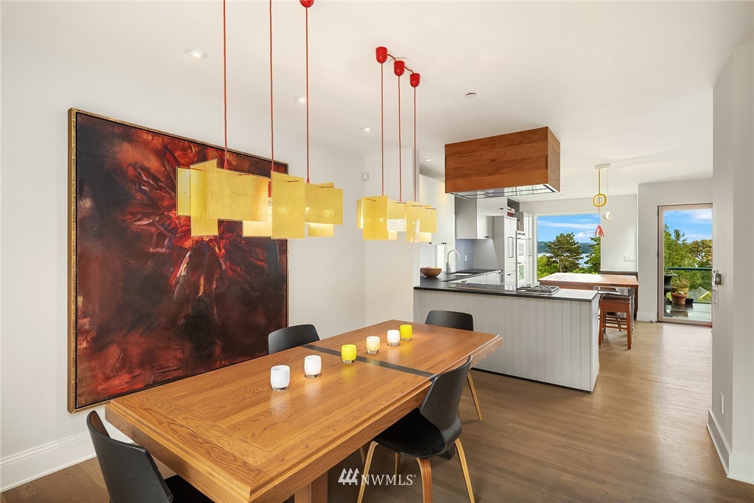 1618 37th Avenue Seattle, WA 98122 - Photo 10 of 39 a kitchen with a table and chairs