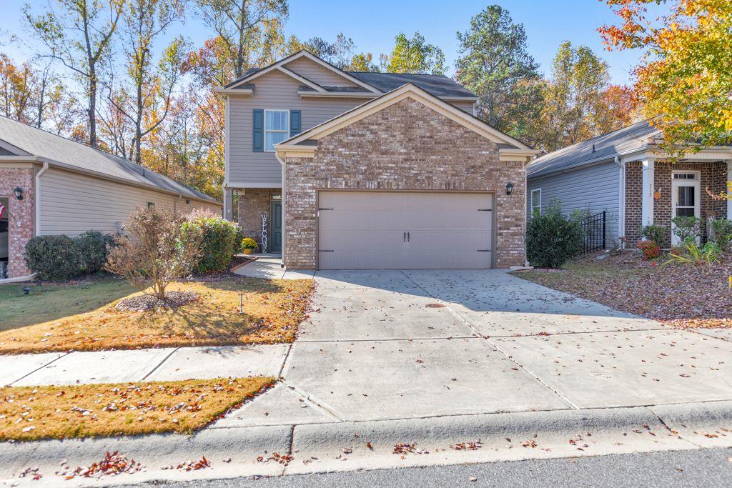 514 Altama Way Acworth, GA 30102 - Photo 1 of 1 a view of a house with a yard