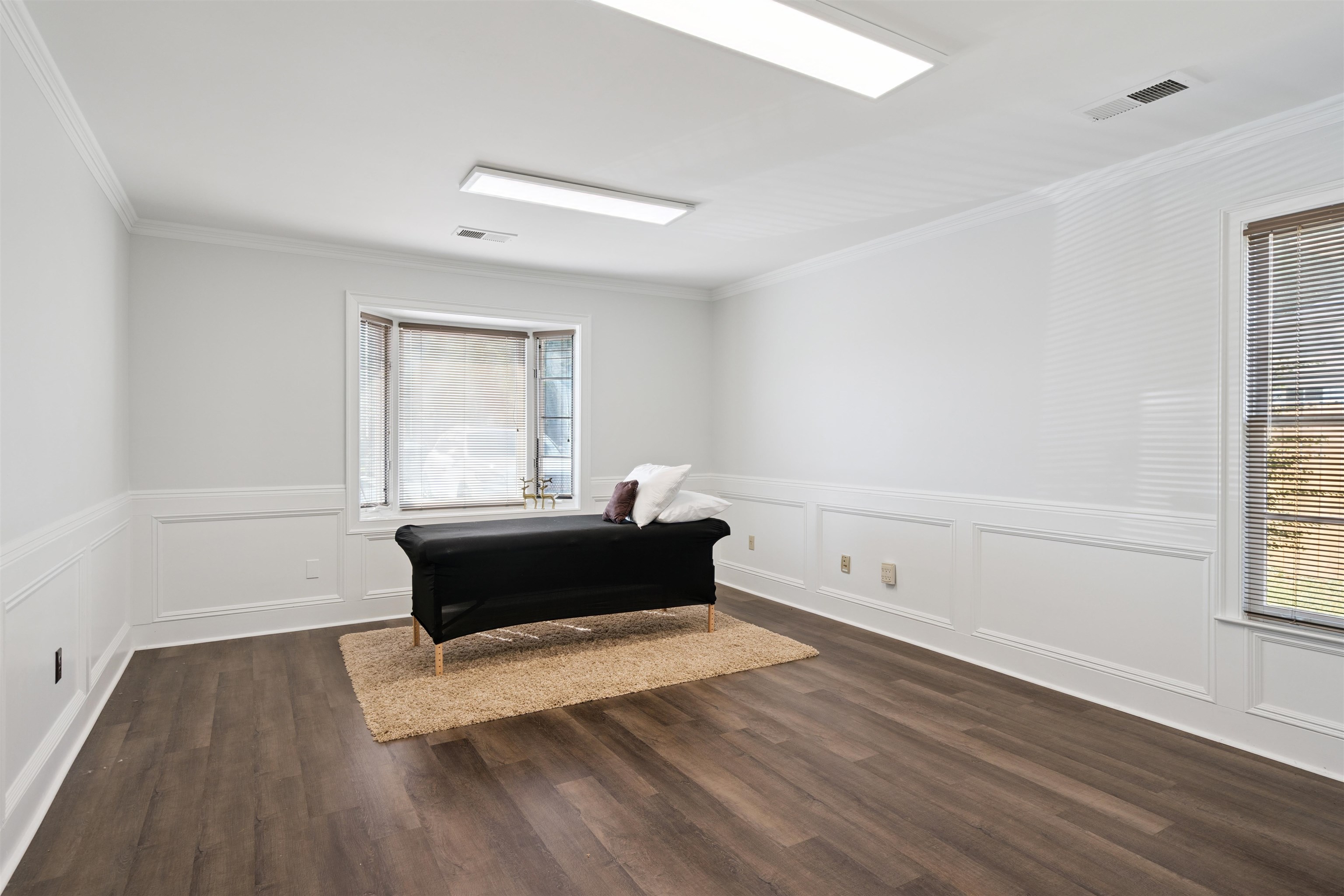 352 Poplar View Lane East Collierville, TN 38017 - Photo 6 of 16 an empty room with wooden floor and windows