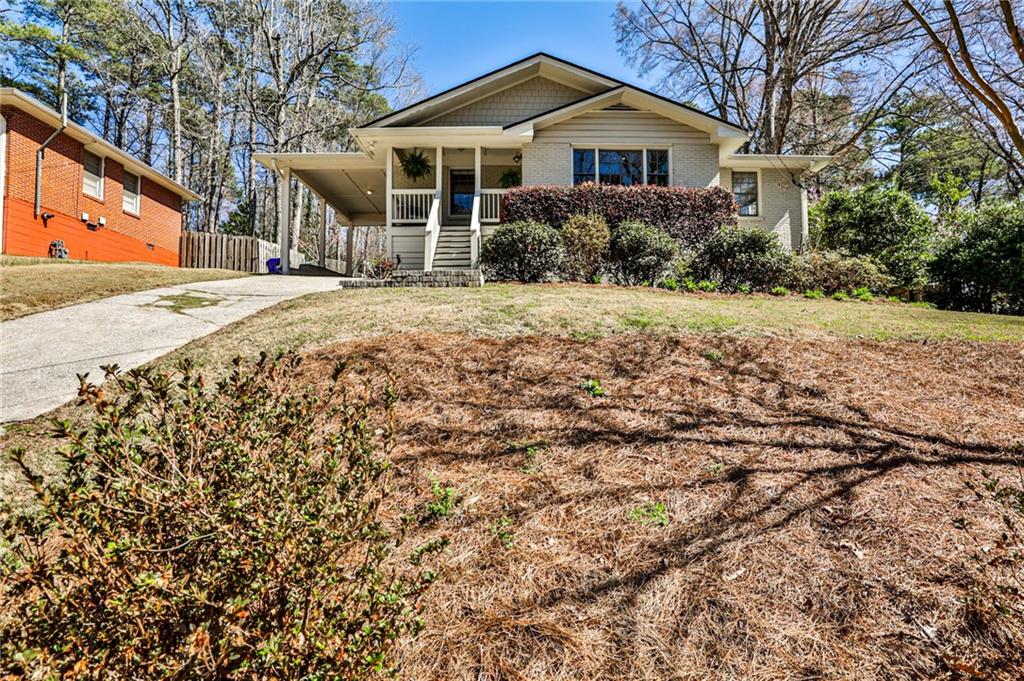 1031 Willivee Drive Decatur, GA 30033 - Photo 1 of 1 a front view of the house with a yard