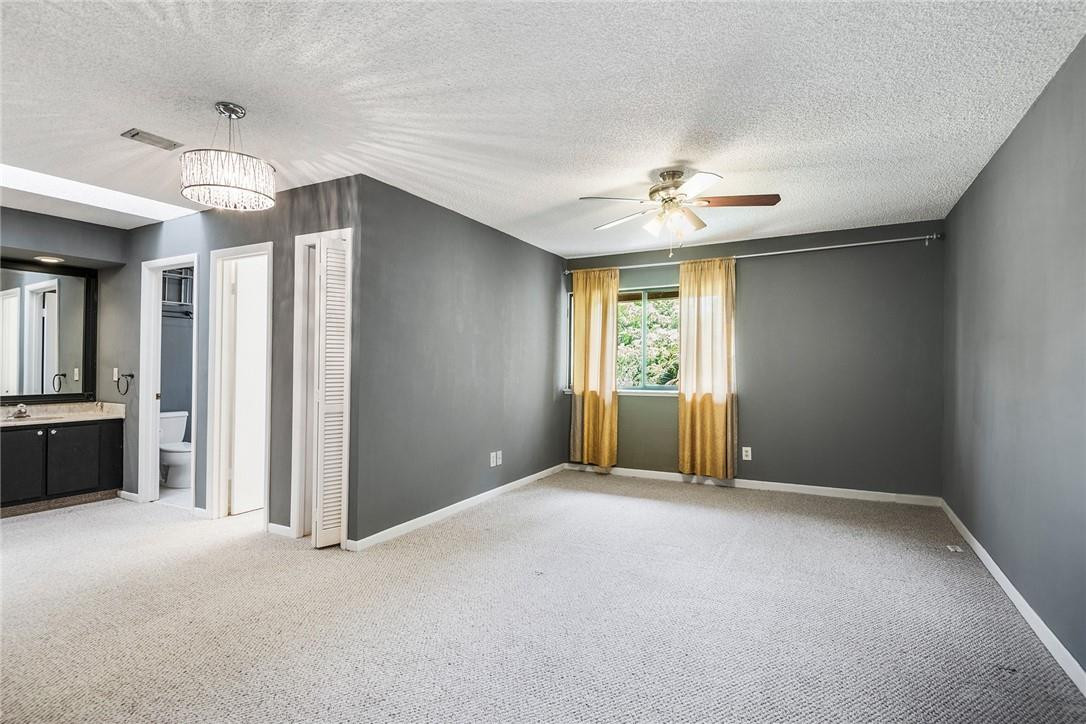 6535 Parkview Drive, Unit G Boca Raton, FL 33433 - Photo 16 of 27 a view of an empty room with a window
