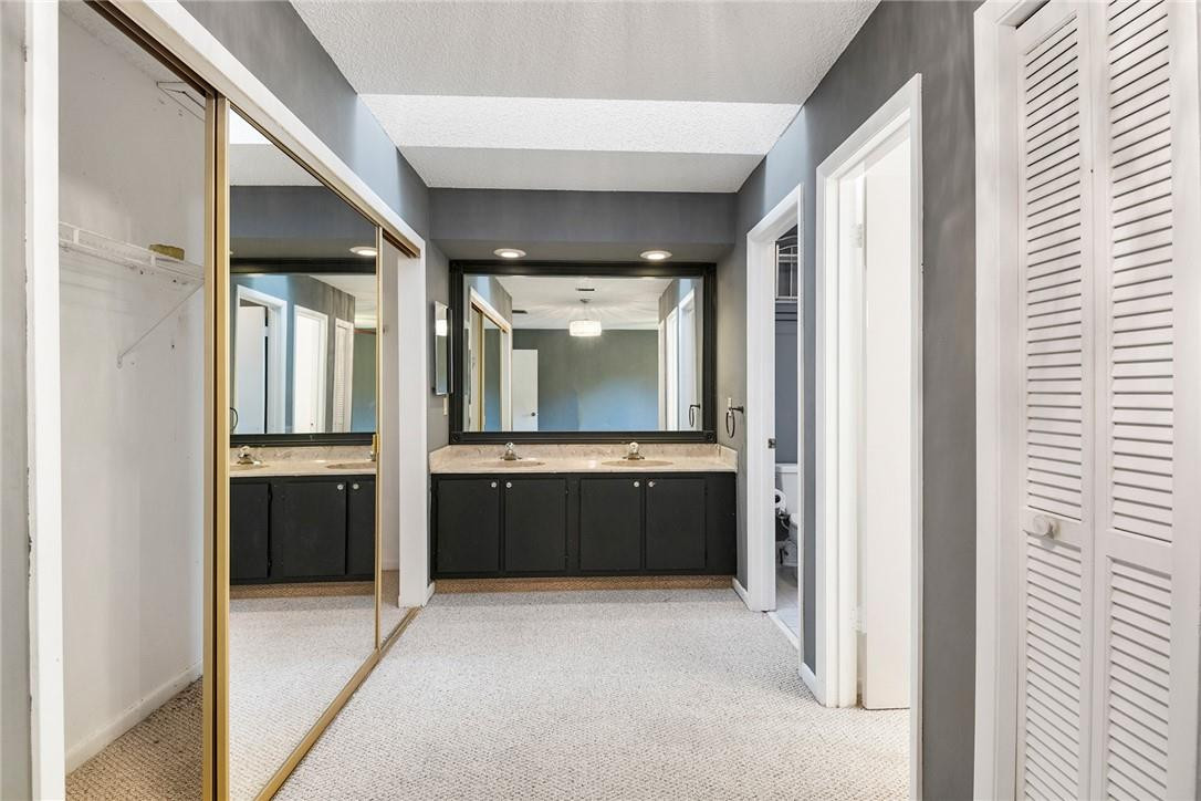 6535 Parkview Drive, Unit G Boca Raton, FL 33433 - Photo 18 of 27 a large bathroom with a tub and shower