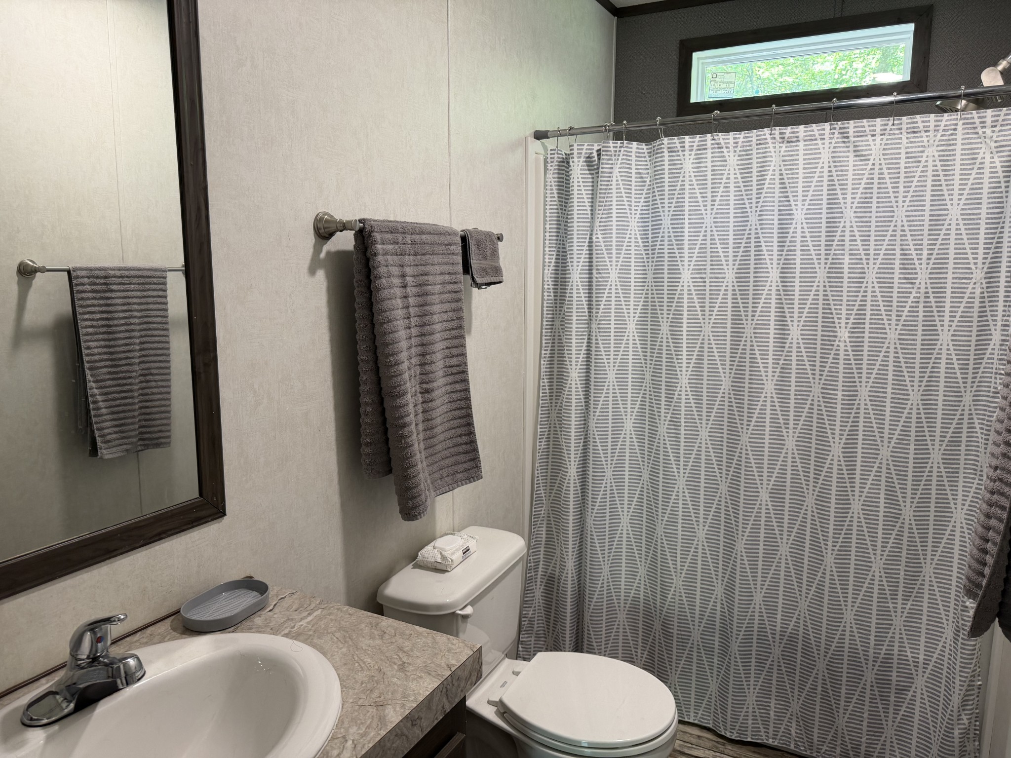 1851 Hicks Hollow Road Westmoreland, TN 37186 - Photo 8 of 12 a bathroom with a sink toilet and shower