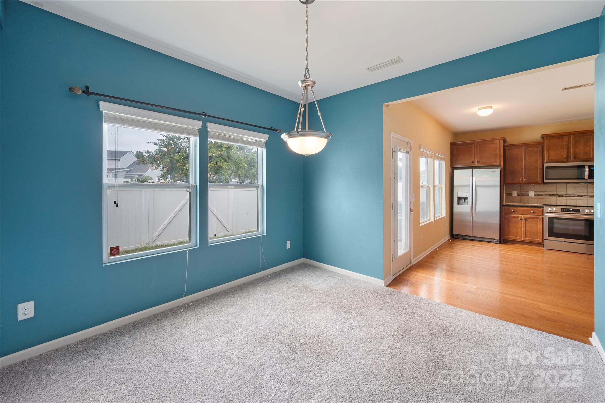 4720 Tradd Circle Monroe, NC 28110 - Photo 13 of 29 a view interior of a house wooden floor and windows