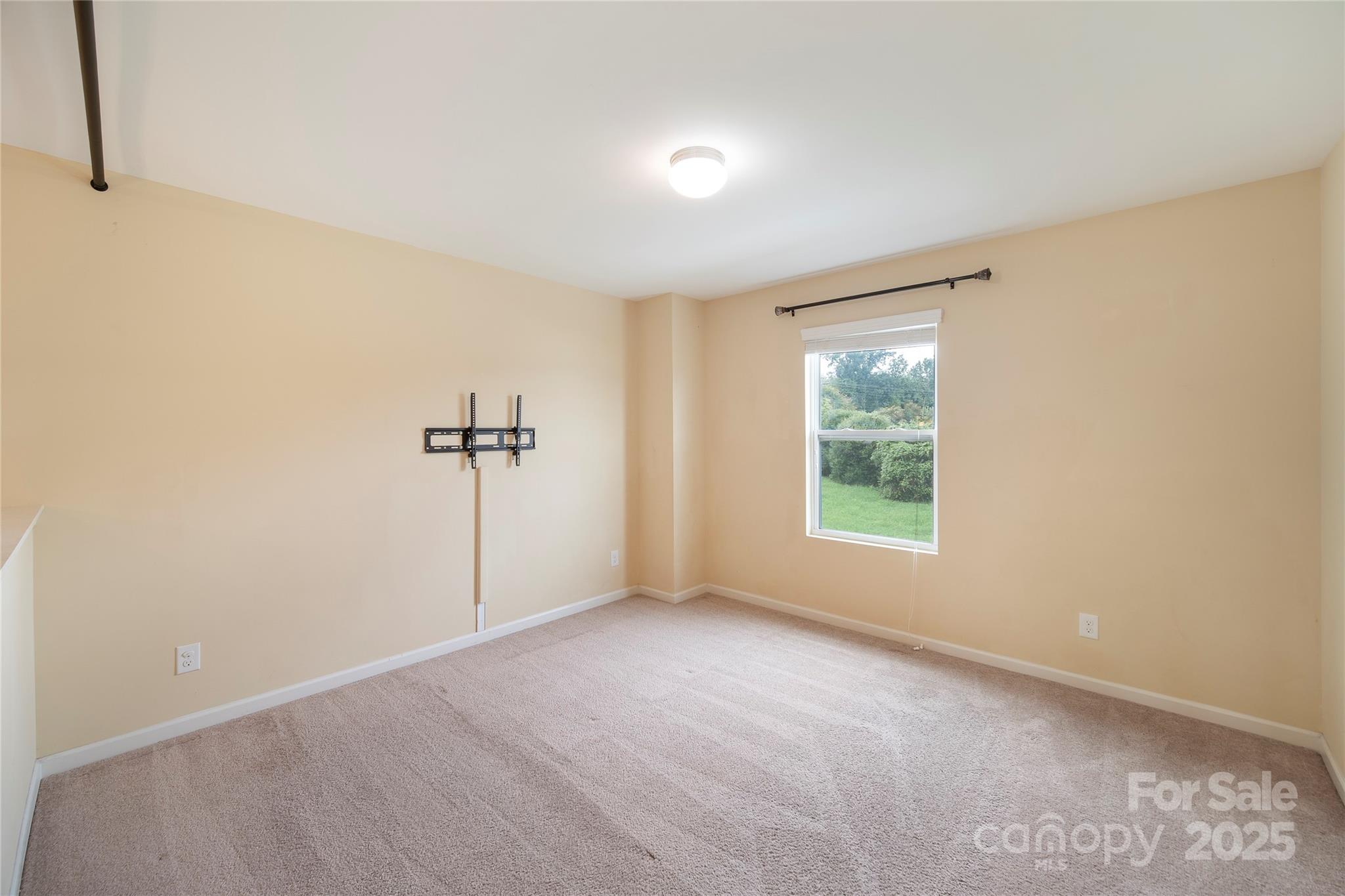 4720 Tradd Circle Monroe, NC 28110 - Photo 15 of 29 an empty room with a window