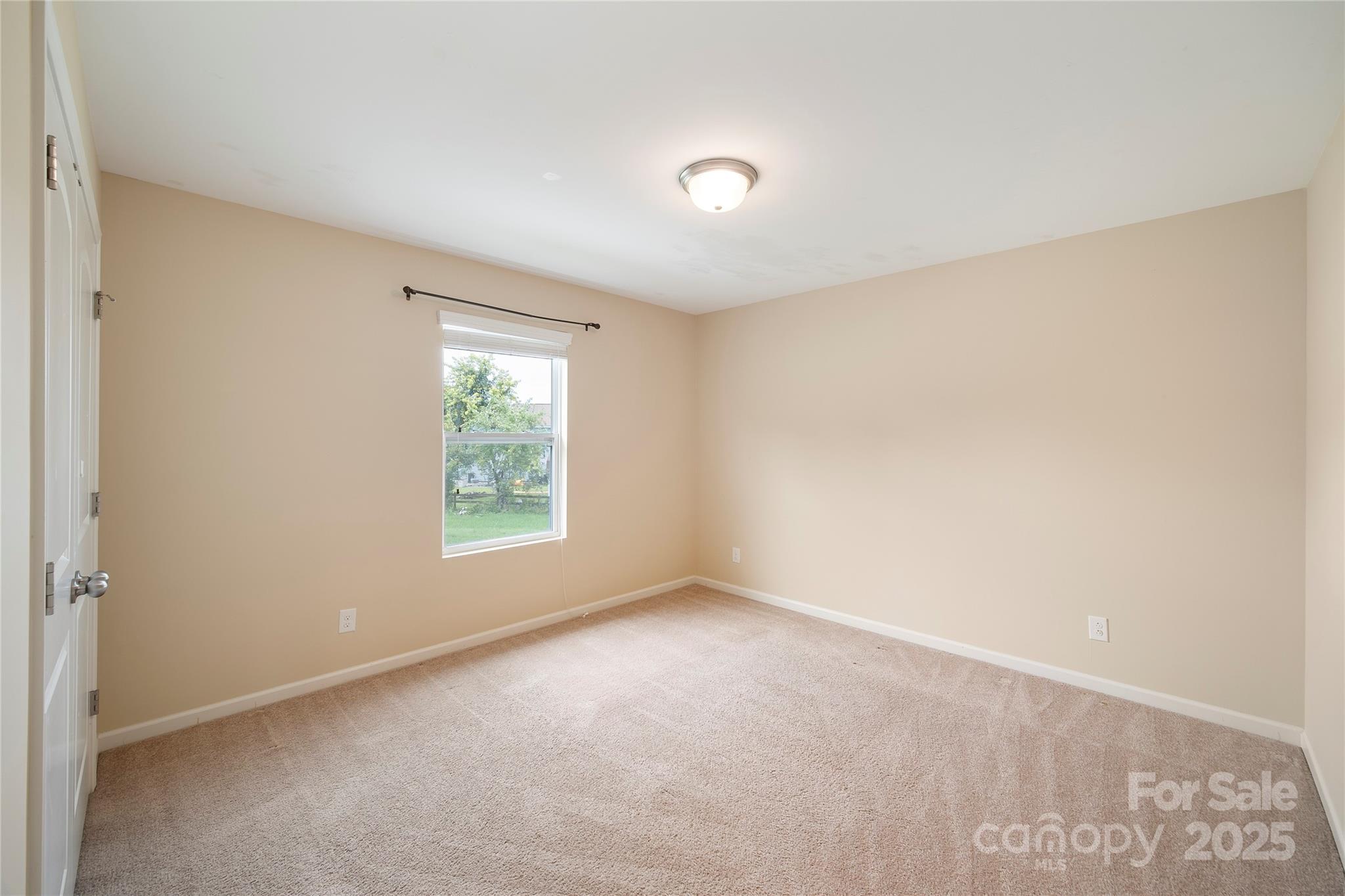 4720 Tradd Circle Monroe, NC 28110 - Photo 16 of 29 a view of an empty room with a window