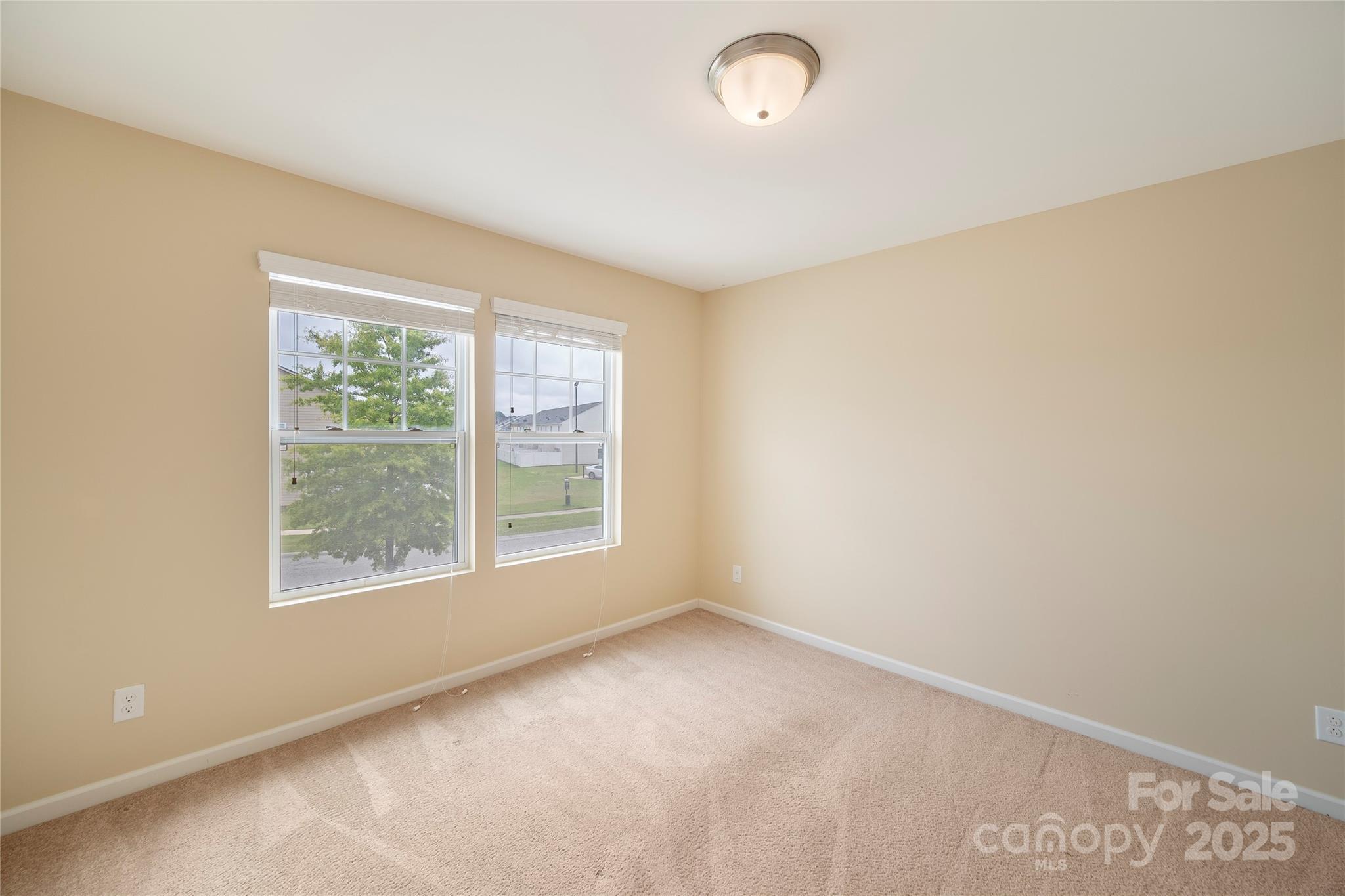 4720 Tradd Circle Monroe, NC 28110 - Photo 21 of 29 an empty room with a window