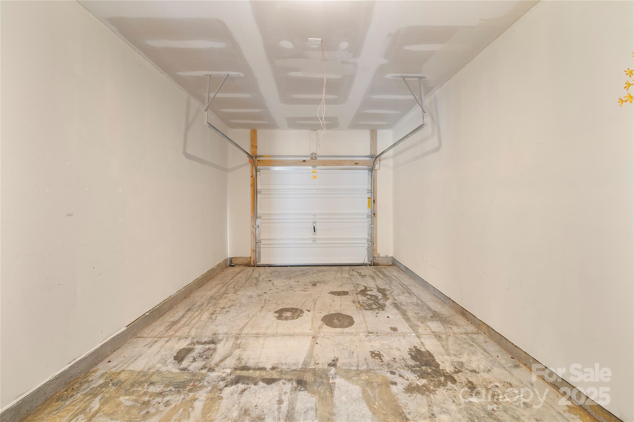 4720 Tradd Circle Monroe, NC 28110 - Photo 27 of 29 a view of a room with rack on the wall