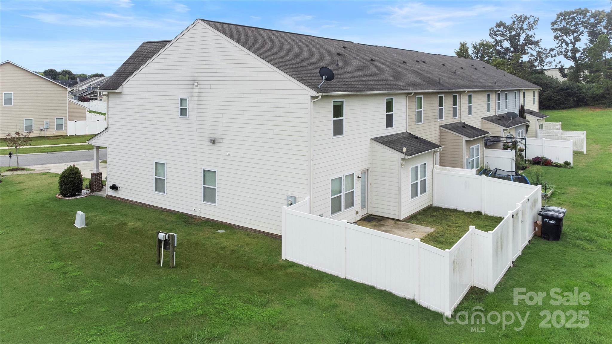 4720 Tradd Circle Monroe, NC 28110 - Photo 28 of 29 a front view of a house with a garden