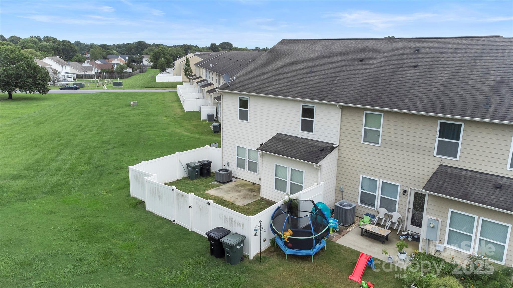 4720 Tradd Circle Monroe, NC 28110 - Photo 29 of 29 a white house that has tree in front of it