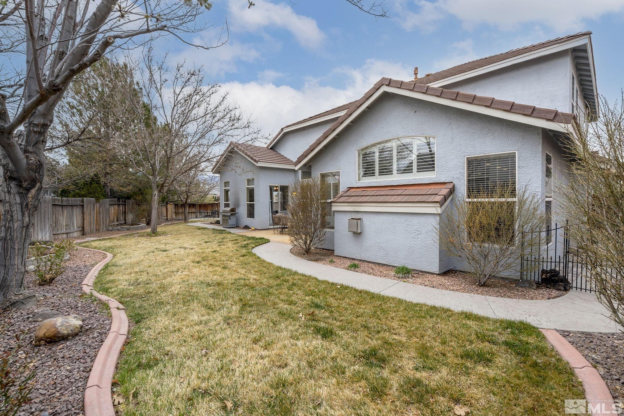 1564 Rio Grande Drive Reno, NV 89521 - Photo 25 of 33 a view of house with yard and outdoor seating