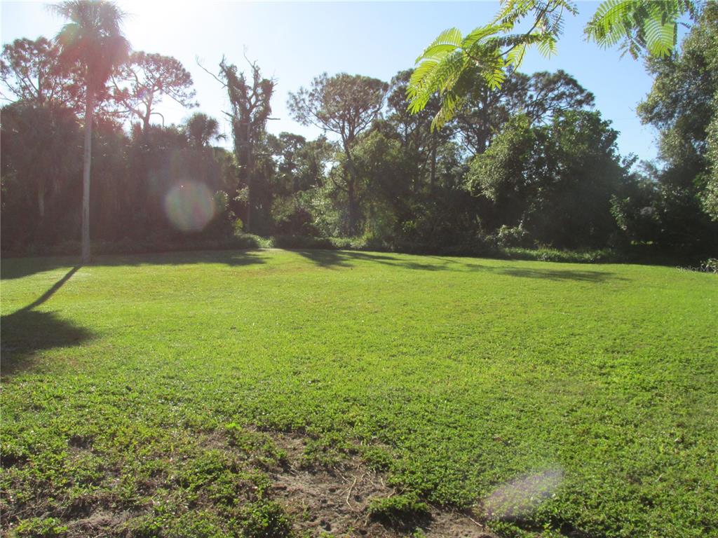 1767 Belvidere Road Englewood, FL 34223 - Photo 13 of 15 a view of a field with an trees