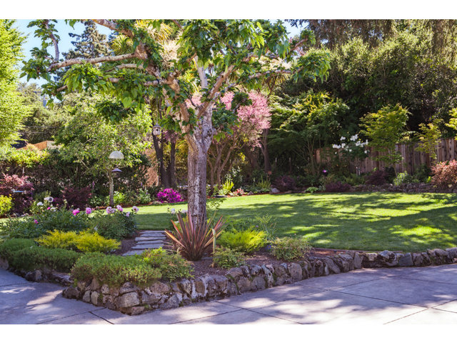 461 Fulton Road San Mateo, CA 94402 - Photo 12 of 14 a front view of a house with a yard