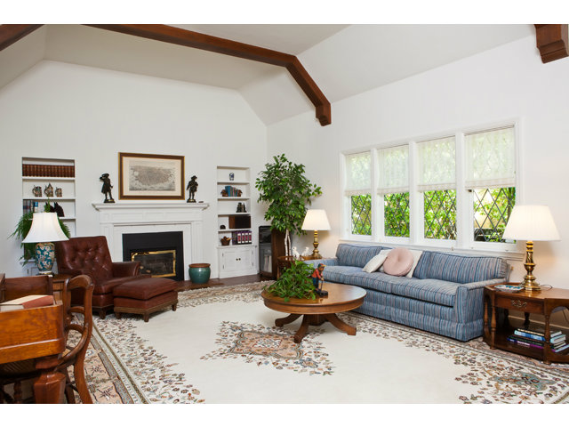461 Fulton Road San Mateo, CA 94402 - Photo 2 of 14 a living room with furniture a fireplace and a large window