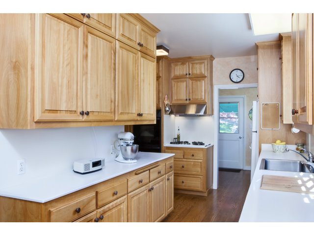 461 Fulton Road San Mateo, CA 94402 - Photo 4 of 14 a kitchen with stainless steel appliances granite countertop a sink a stove and a refrigerator