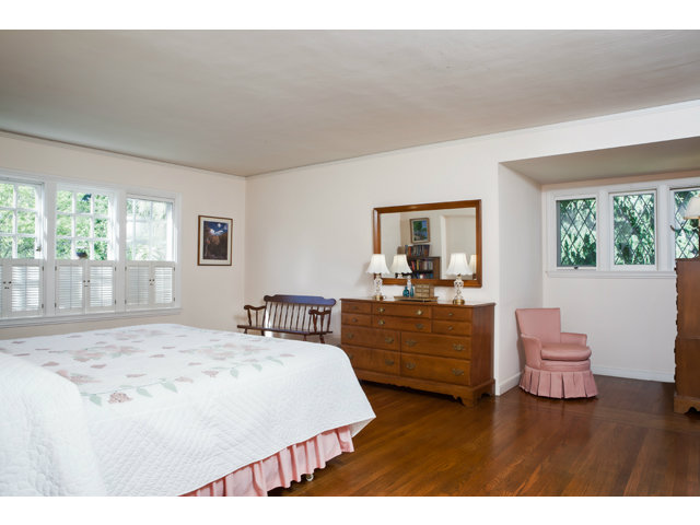 461 Fulton Road San Mateo, CA 94402 - Photo 9 of 14 a bed room with a bed and a chair