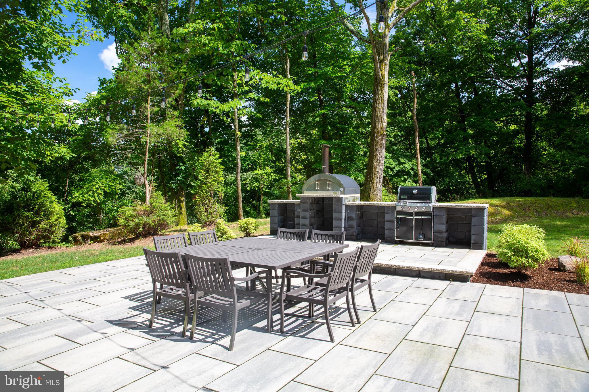 7092 Ely Road New Hope, PA 18938 - Photo 19 of 27 Backyard Slate Patio w/ pizza oven and grill