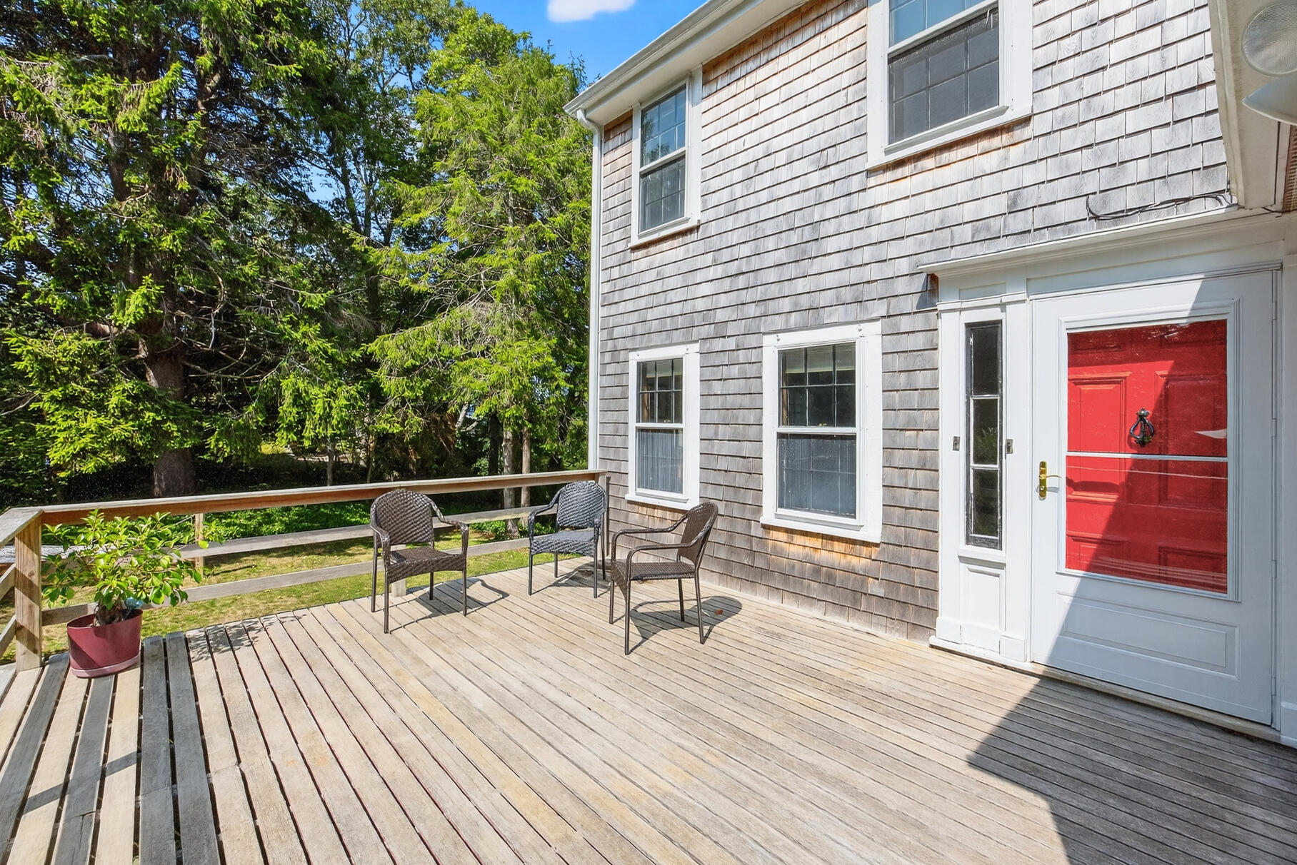 54 Whitman Road Woods Hole, MA 02543 - Photo 54 of 76 a view of balcony with couch and wooden floor