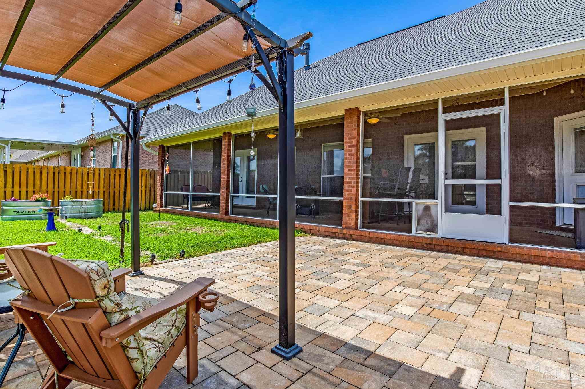 2822 Frederick Street Cantonment, FL 32533 - Photo 45 of 57 a view of a house with backyard and porch