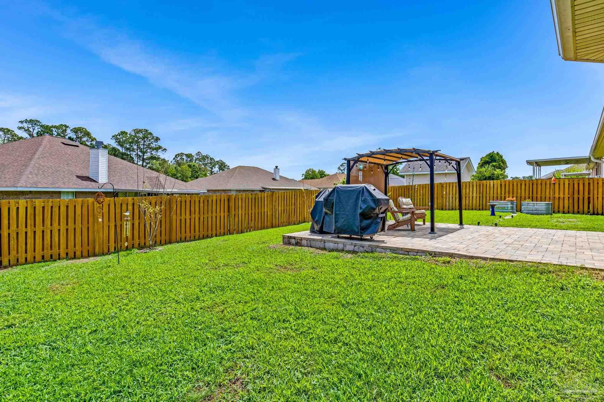2822 Frederick Street Cantonment, FL 32533 - Photo 49 of 57 a view of a garden with a small yard