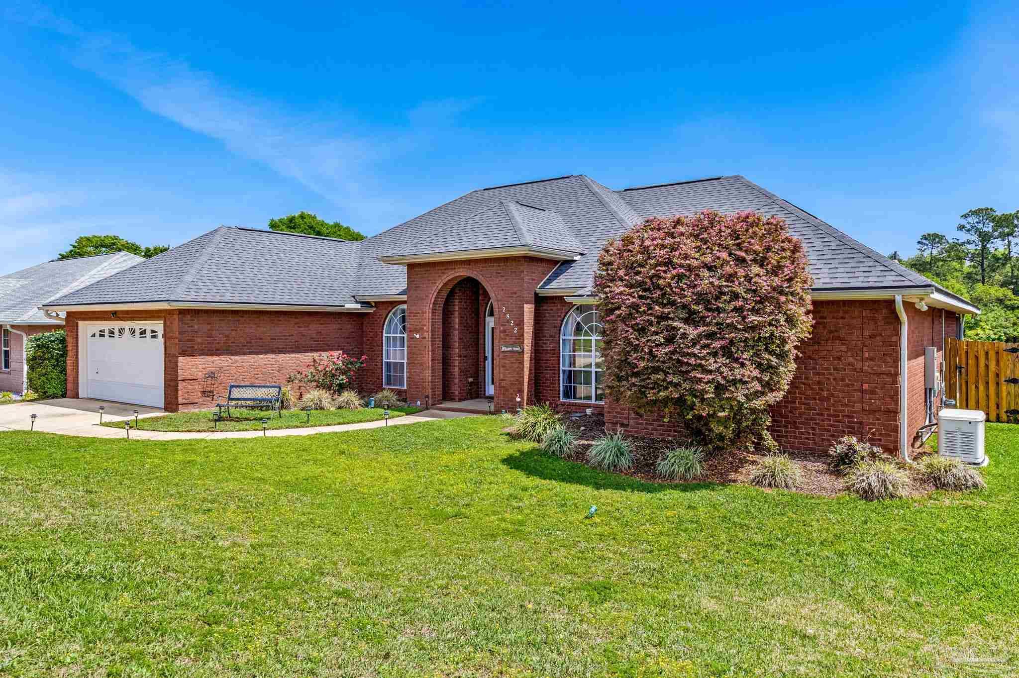2822 Frederick Street Cantonment, FL 32533 - Photo 56 of 57 a view of a house with a backyard