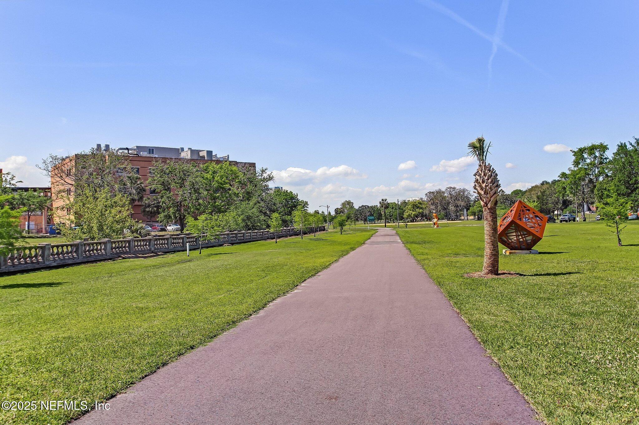 240 East 6th Street Jacksonville, FL 32206 - Photo 29 of 37 a view of a park with swings and slides