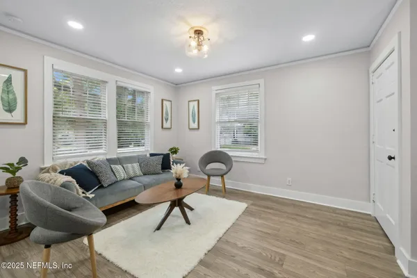 a living room with furniture and a window