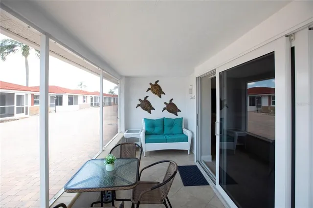 a workspace with furniture and a window