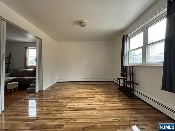 a view of an empty room and window
