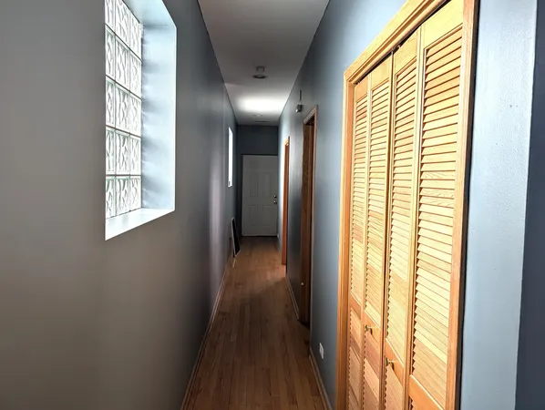 a view of hallway with windows