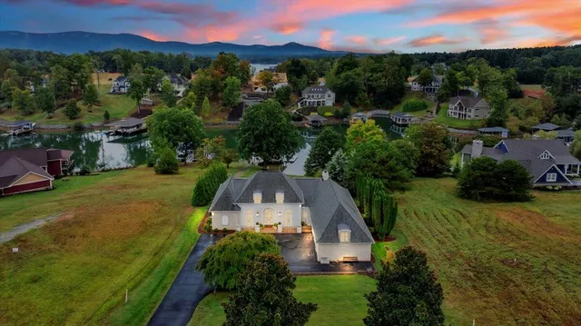 an aerial view of a house with mountain view