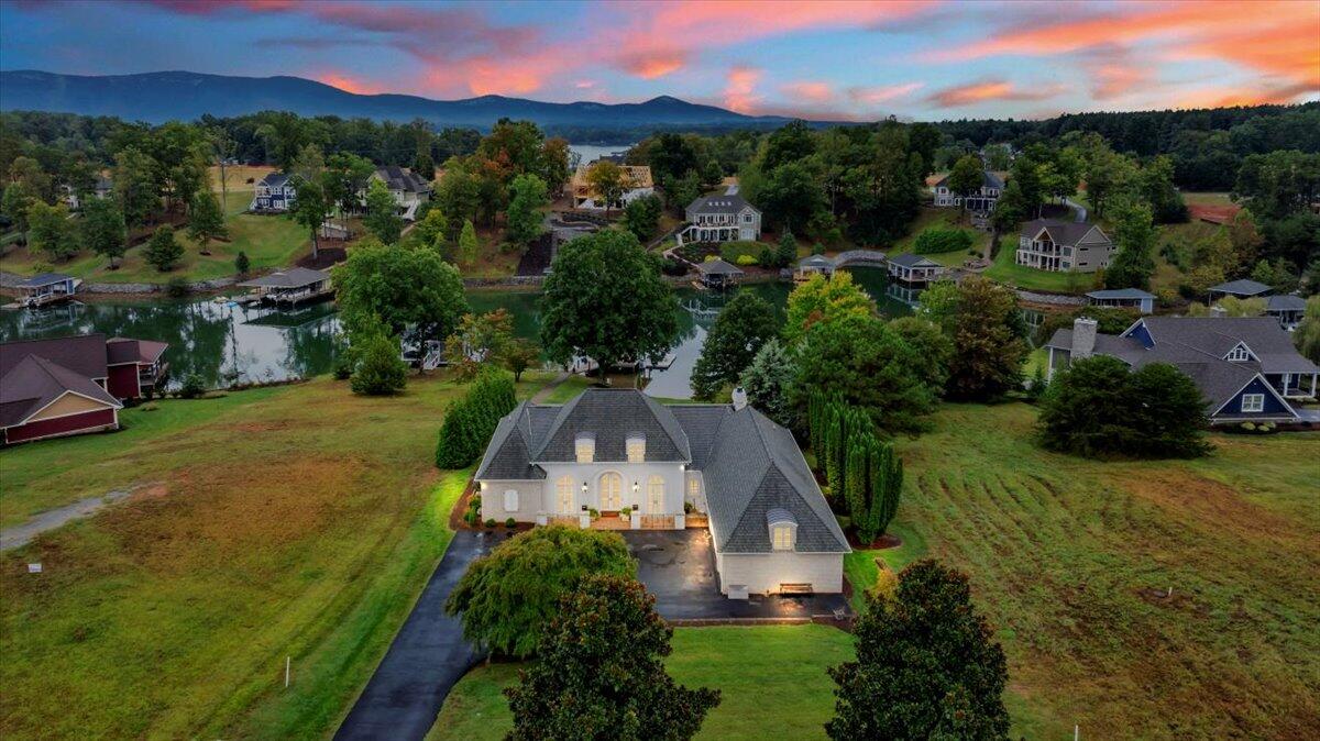 an aerial view of a house with mountain view