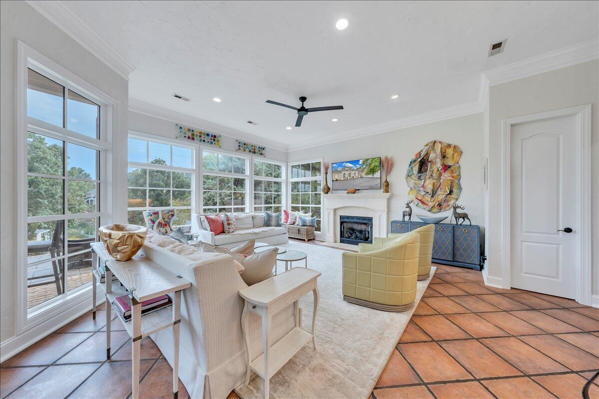 6 Compass Moneta, VA 24121 - Photo 16 of 60 a living room with furniture a flat screen tv and a floor to ceiling window
