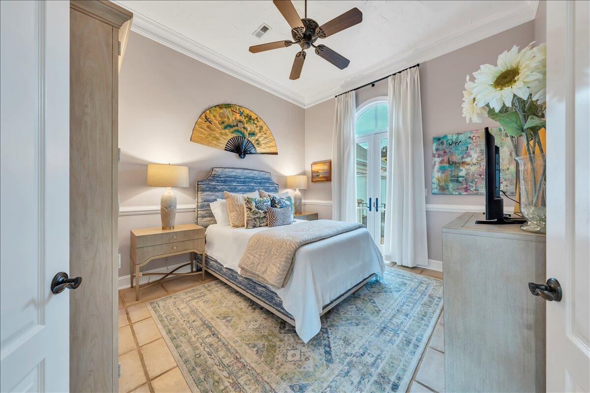 6 Compass Moneta, VA 24121 - Photo 21 of 60 a bedroom with a bed and a chandelier