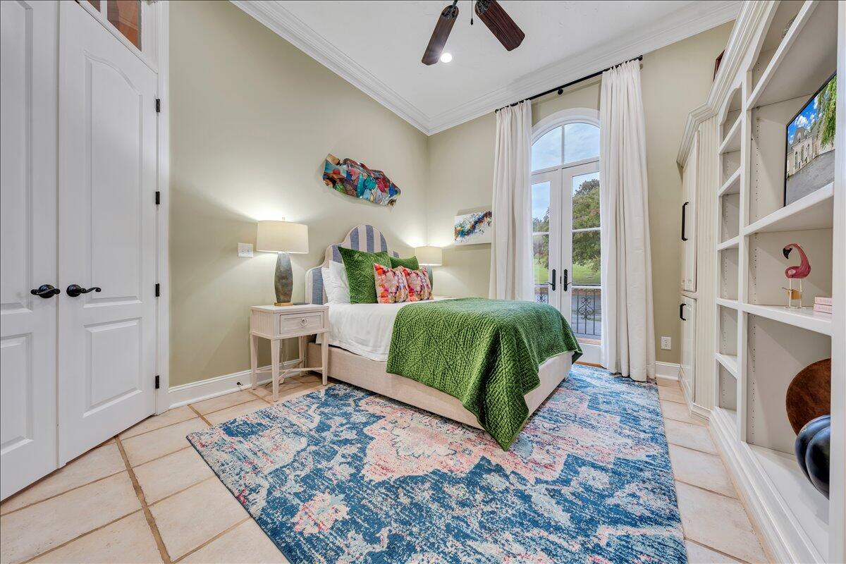 6 Compass Moneta, VA 24121 - Photo 24 of 60 a bedroom with a bed and a chandelier