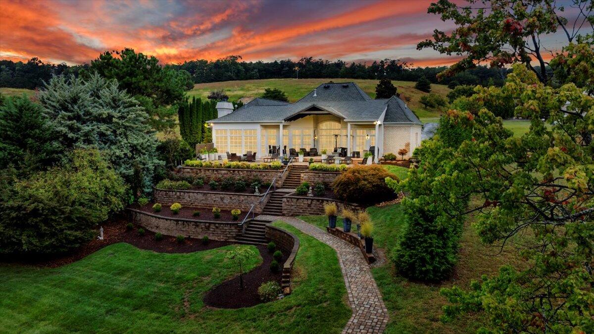 6 Compass Moneta, VA 24121 - Photo 39 of 60 a view of a big house with a big yard plants and large trees