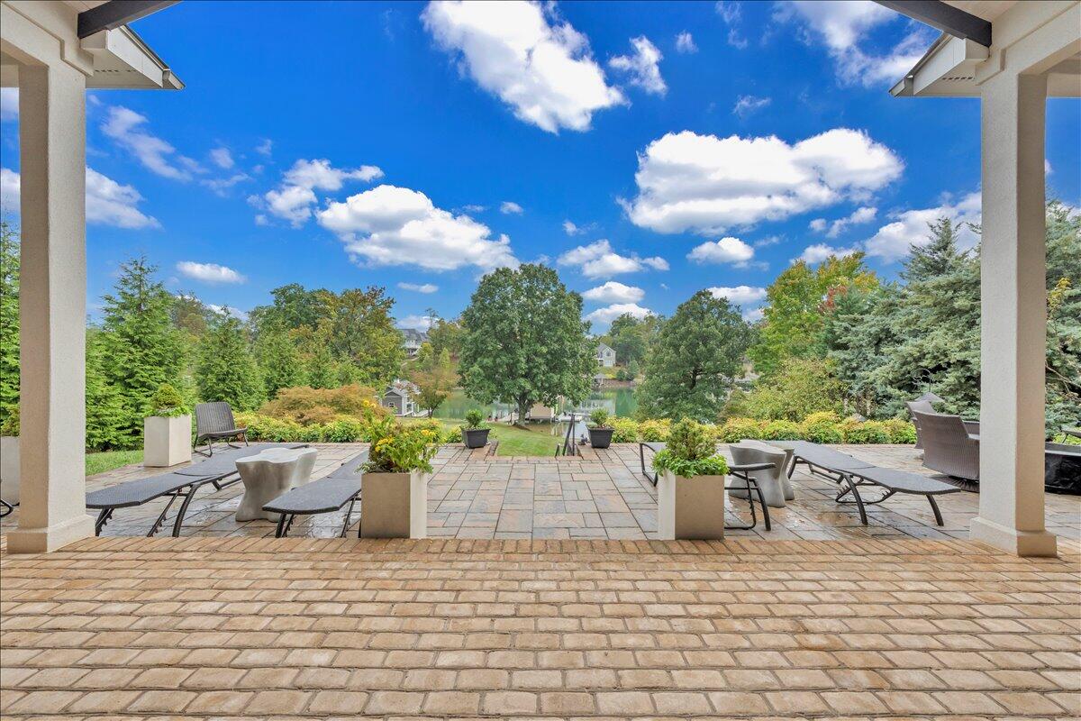 6 Compass Moneta, VA 24121 - Photo 41 of 60 a view of a patio with a dining table and chairs