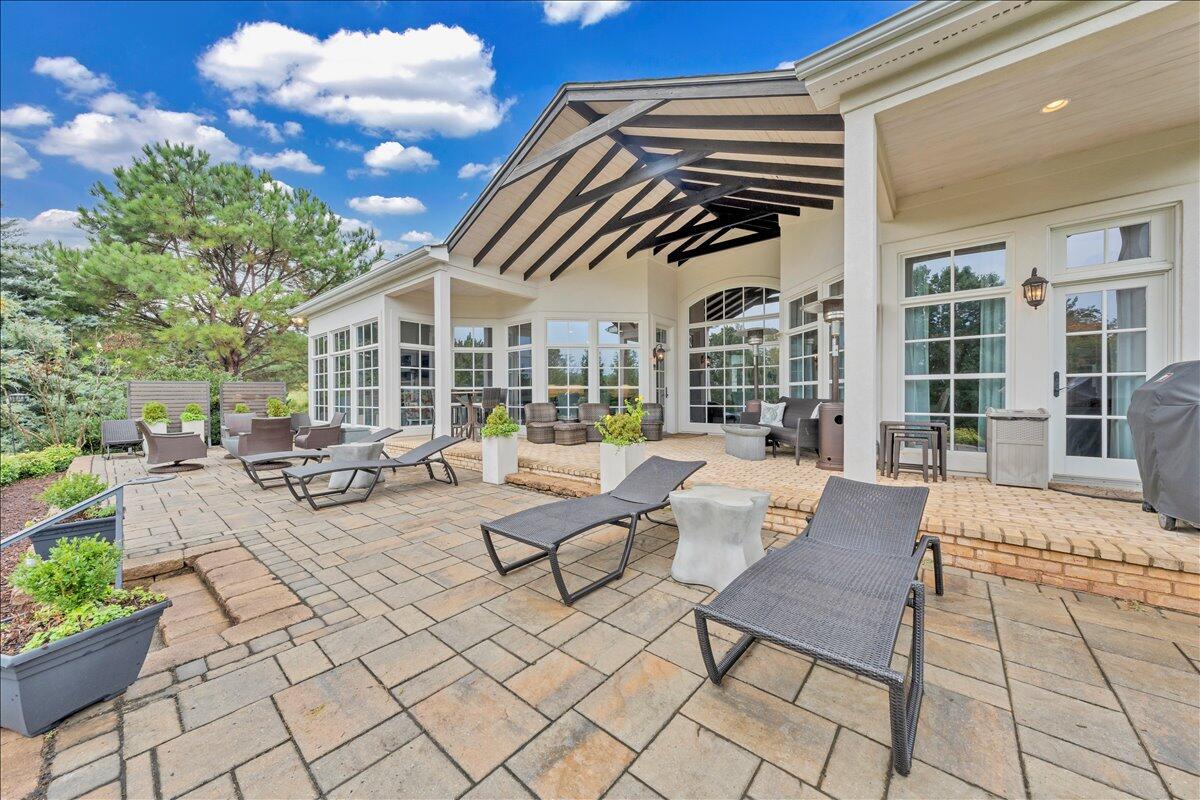 6 Compass Moneta, VA 24121 - Photo 47 of 60 a view of a patio with dining table and chairs with wooden floor