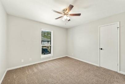 7700 Chapin Road, Unit 7 Fort Worth, TX 76116 - Photo 7 of 13 Room featuring light neutral wall paint, a beige carpeted floor, and a window with blinds