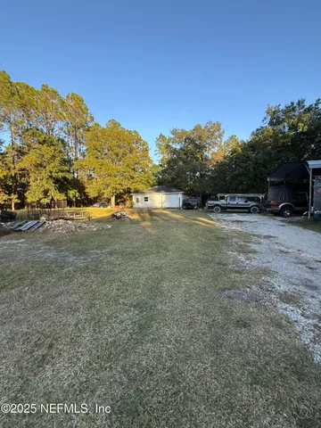 a view of an ocean and mountains