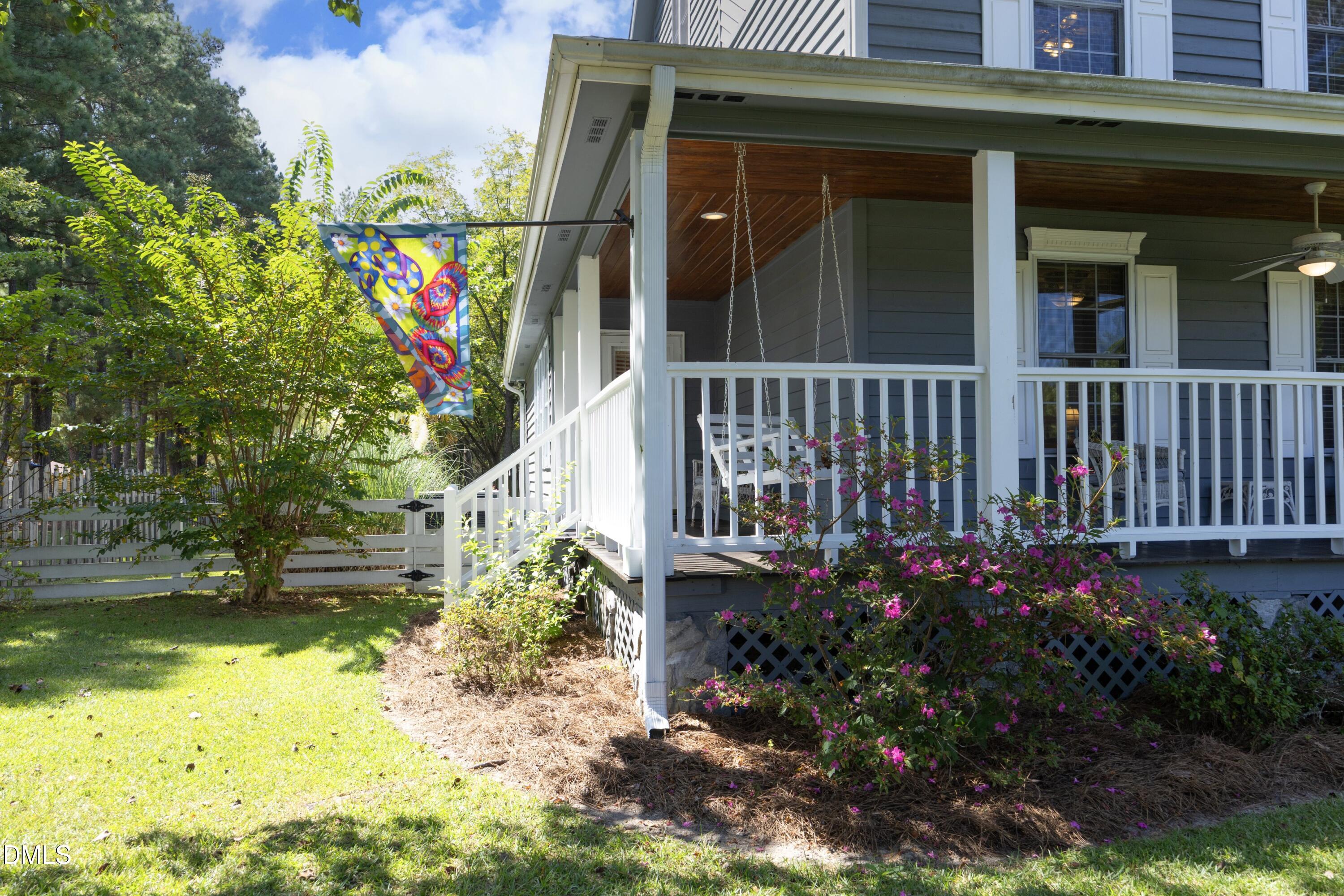 1746 Little Devine Road Selma, NC 27576 - Photo 12 of 79 15PorchWithSwing