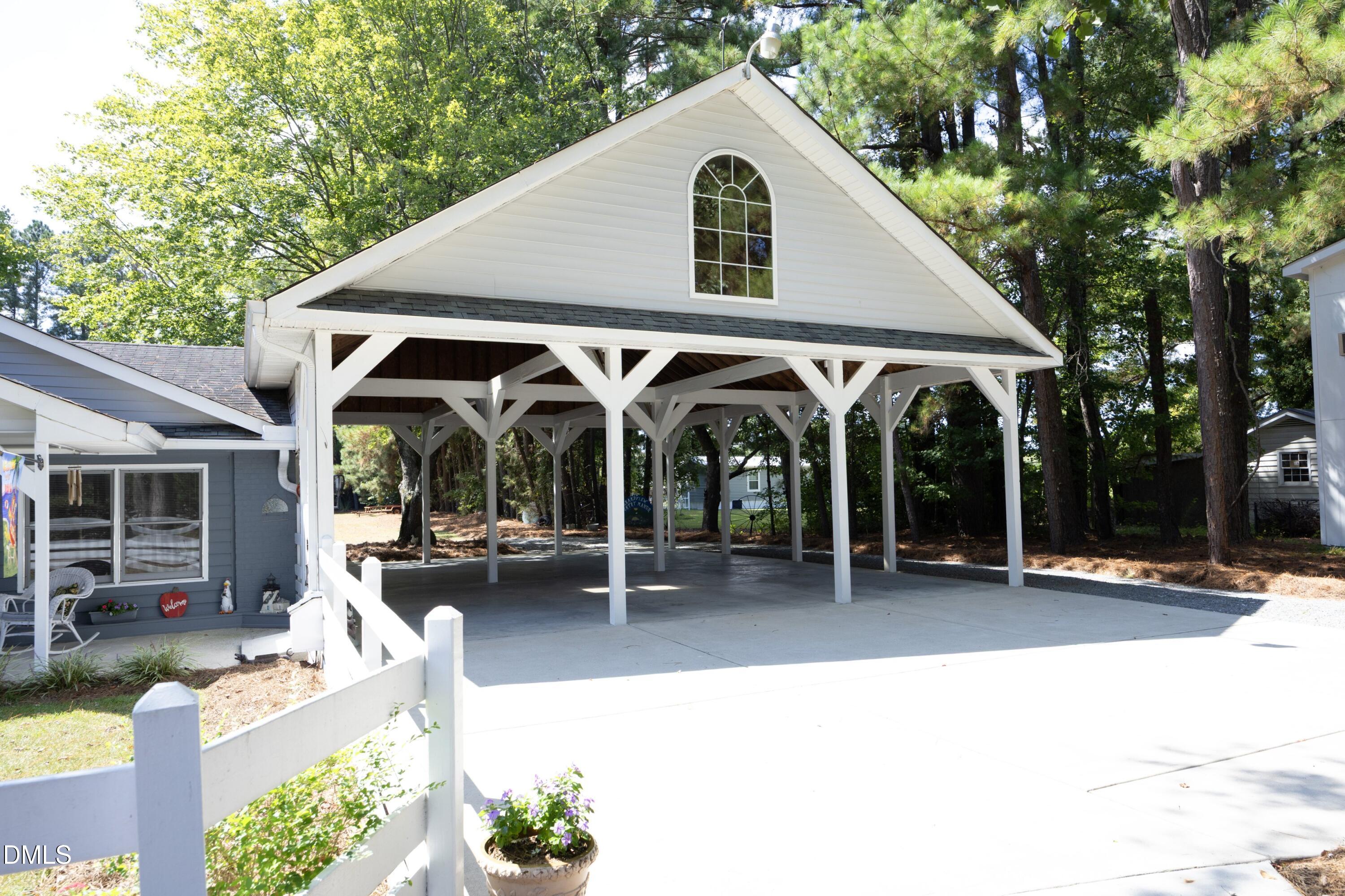 1746 Little Devine Road Selma, NC 27576 - Photo 14 of 79 06Carport