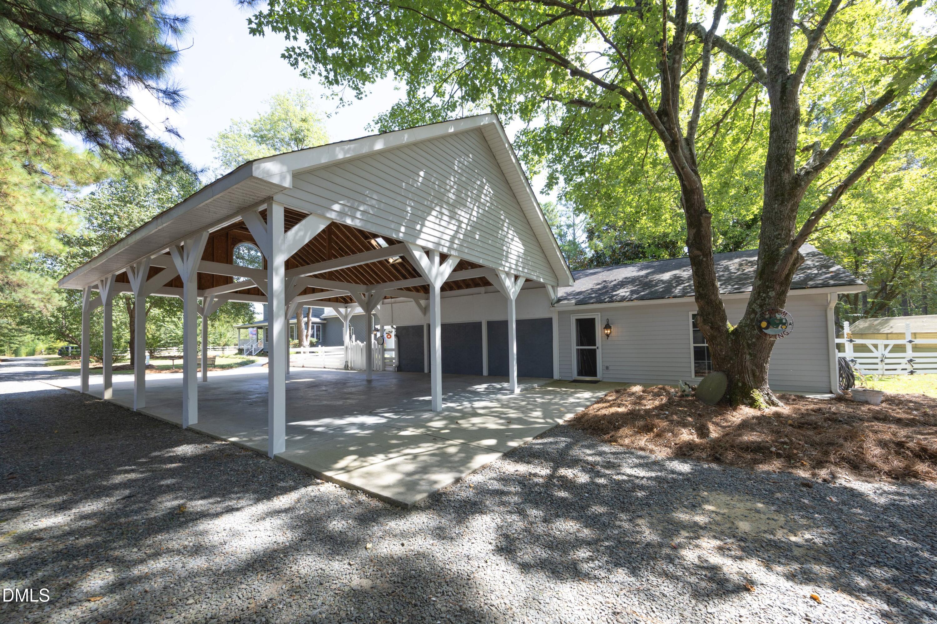 1746 Little Devine Road Selma, NC 27576 - Photo 16 of 79 07Carport