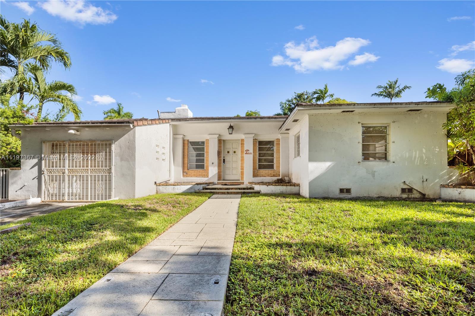 531 Northeast 55th Terrace Miami, FL 33137 - Photo 1 of 22 a view of a house with backyard and sitting area