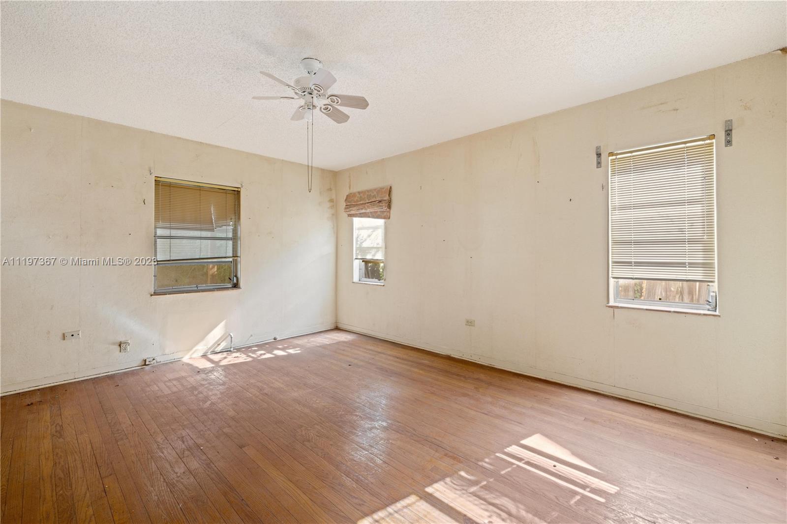 531 Northeast 55th Terrace Miami, FL 33137 - Photo 12 of 22 a view of an empty room with a window