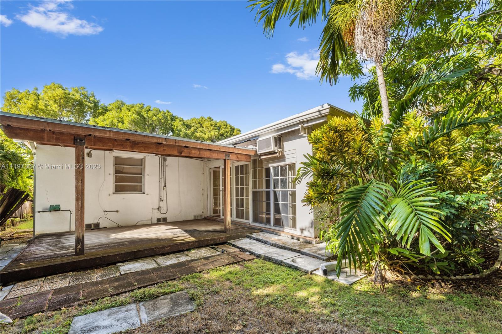 531 Northeast 55th Terrace Miami, FL 33137 - Photo 6 of 22 a view of a house with a patio